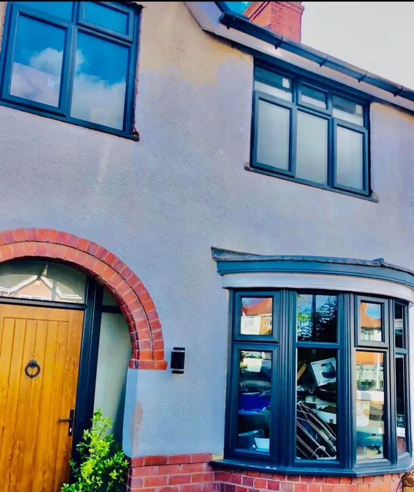 Completed home with anthracite windows and entrance